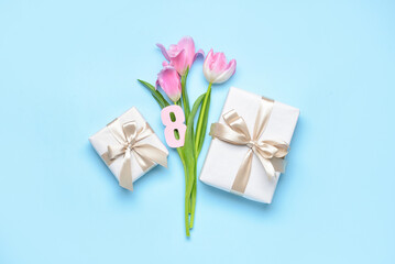 Composition with gift boxes and tulip flowers on color background. International Women's Day celebration