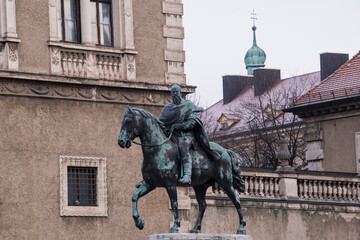 Obraz premium Germany, Munich- December 20,2021: View of prince regent Luitpold equestrian statue next to famous Bavarian National Museum in the city center of the Bavarian capital.