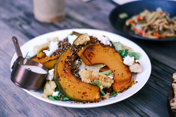 baked potato with cheese and herbs