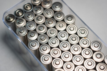 AA batteries background closeup view
