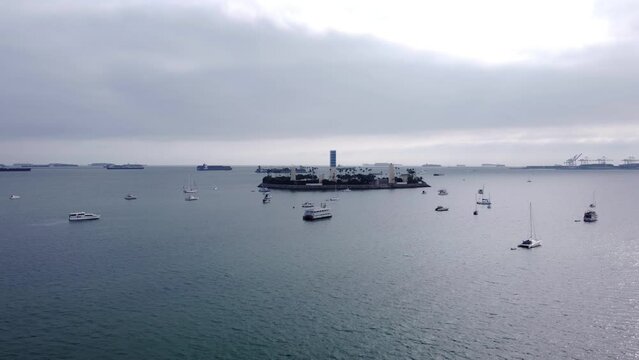 An amazing aerial drone shot, drone flying towards Thums Island in Long Beach, California.
