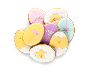 Different Easter cookies in shape of eggs on white background