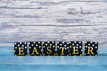 word easter on wooden with copy space