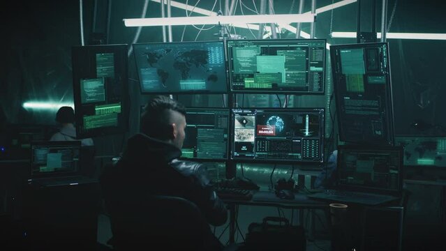 A male hacker in a casual jacket on a chair, hacking a nuclear weapon launch on a computer with a countdown in a dark cybercriminal hideout