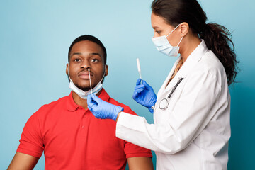 Professional Nurse Making Covid-19 PCR Test For Patient, Studio Shot