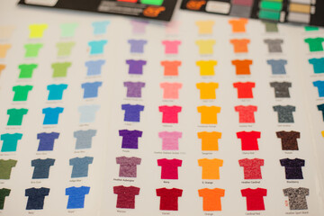 T-shirt color selection for marketing advertising business textile fabric cloth production. Digital film craft. Close up