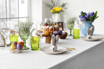 Beautiful table setting with beautiful flowers for Easter celebration