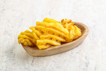 Fried potato slice in the bowl