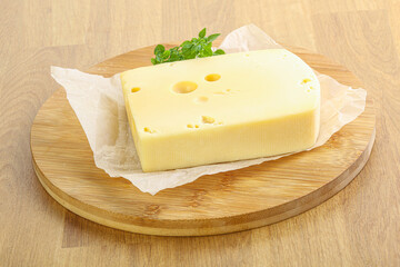 Maasdam cheese over the board