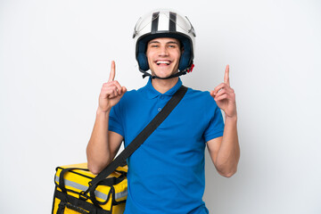 Young caucasian man with thermal backpack isolated on white background pointing up a great idea
