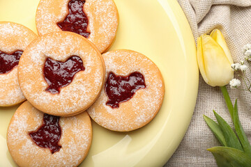Plate with tasty Easter cookies, closeup