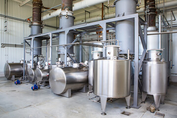 Large group of green recycled glass wine bottles at winery