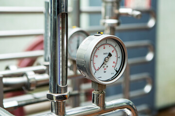 Large group of green recycled glass wine bottles at winery