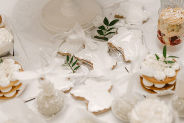 Beautiful candy bar for epiphany, white angels gingerbread, trifles and cupcakes