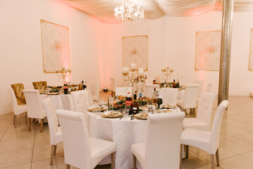 Round tables with food, large festive tables