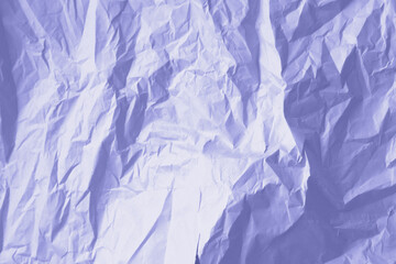 Obraz premium Crumpled paper Very Peri color of the year 2022. Texture crumpled paper for your design. Copy space. Very Peri color paper.