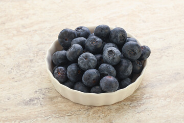 Sweet ripe blueberry heap in the bowl