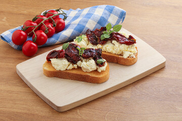 Bruschetta with soft cheese and tomato