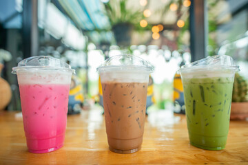 Cold sweet drinks placed on the bar.