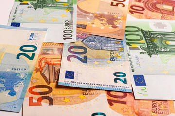 Euro currency banknote background. Close-up of Euro paper money in cash. Different banknotes in European currency on the table. Background from paper money.