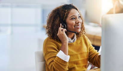 Her display of care in customers is great business. Shot of a female agent working in a call centre. - obrazy, fototapety, plakaty