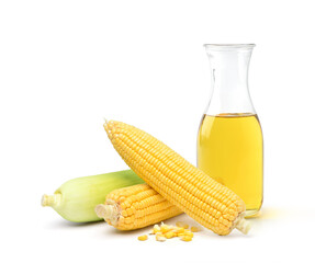 Corn oil in glass bottle with fresh corn isolated on white background.