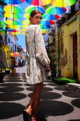 woman walking in the city in penang georgetown malaysia