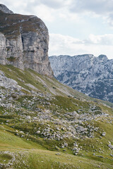 Stone mountain on the background of the ridge of the Sedlo Pass in the Durmitor National Park
