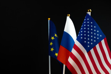 Russia, Europe Union and USA flag on black background. Crisis, sanctions concept. World conflict