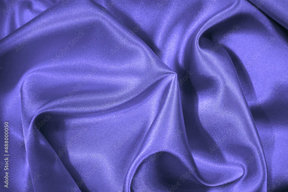 Wall mural purple blue silk satin. beautiful soft folds. shiny fabric surface. elegant background with space fo
