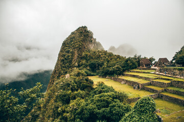 ruins of the ancient castle. The site of machu picchu on a cloudy day