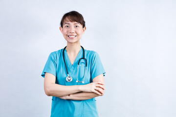 Covid-19, social distancing and coronavirus pandemic concept. Close-up portrait of confident smiling asian female doctor