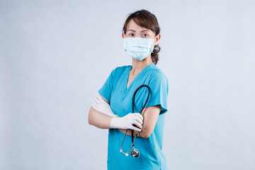 Covid-19, social distancing and coronavirus pandemic concept. Close-up portrait of confident smiling asian female doctor