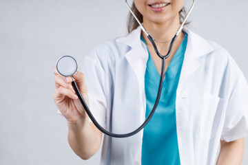 Covid19, coronavirus, healthcare and doctors concept. Portrait of professional confident young asian doctor in medical mask and white coat, stethoscope over neck, ready help patient, fight disease