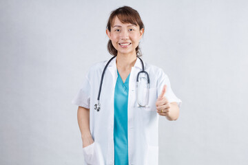 Covid19, coronavirus, healthcare and doctors concept. Portrait of professional confident young asian doctor in medical mask and white coat, stethoscope over neck, ready help patient, fight disease