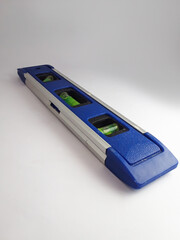 a waterpass on isolated white with copy space taken in a studio