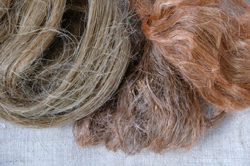 Hemp or linen tow dyed with natural dyes on hemp fabric.