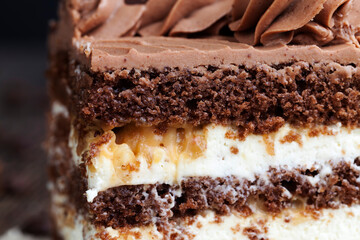 piece of layered cake with nuts and caramel