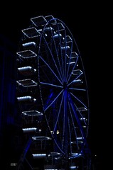 Fototapeta na wymiar Lighting Ferris wheel at night in amusement Park, Rijeka, Croatia.Ferris wheel in an amusement park at night time
