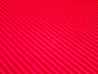 red background with longitudinal radial stripes. High quality photo