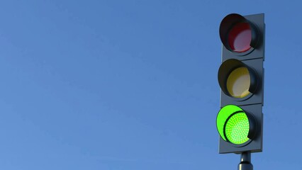 Traffic light with sky background