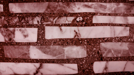 background of red marble and pebble textured tile. light marble pavements on brown pebble background in close up view. luxury and elegant background.