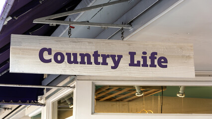 Street Sign to Country Life