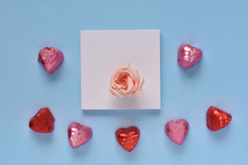 holiday card, a composition of hearts and roses on a white square, a gift for a woman