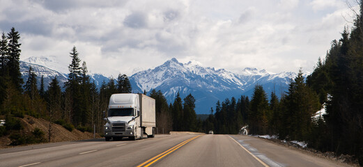 transport truck travelling on the Trans Canada Highway eastbound near Rogers Pass British Columbia...