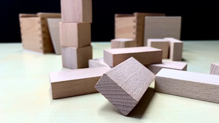 Children's educational game made of natural wood for teaching geometric shapes, counting and improving fine motor skills