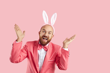Ta da it's me aren't you surprised. Happy guy in bunny costume having fun on Easter Day. Excited...