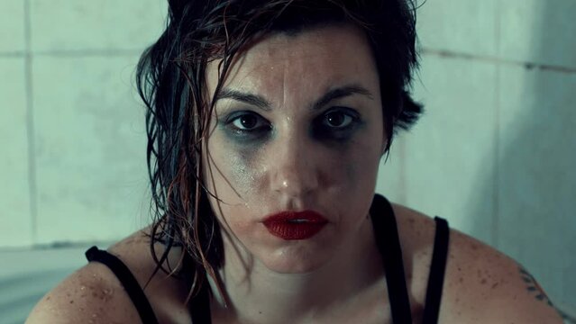 trauma, shock - traumatized girl after a bad night stares at the camera