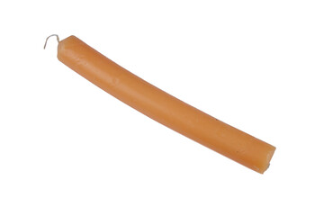 Orange long paraffin candle. Source of light. Isolated