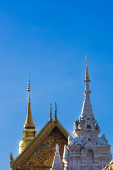 Fototapeta na wymiar Landscape view of buddhist temple with blue sky background